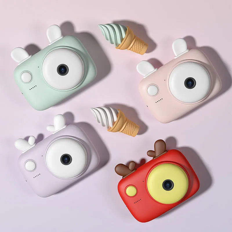 A2 kids digital camera in macaron design with colour screen, shown in green, pink, purple, and red.