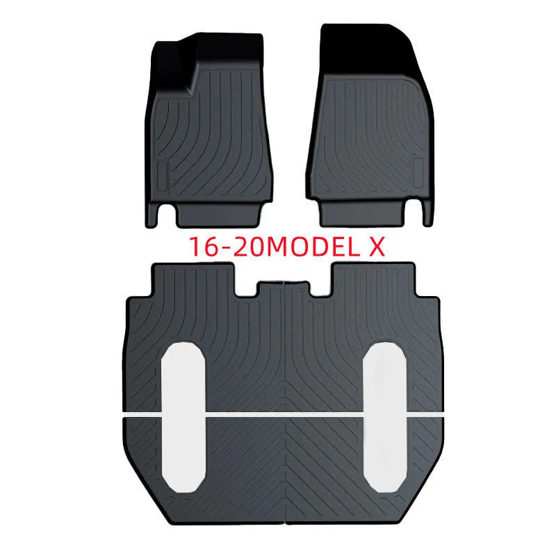Rubber floor mat for Tesla car with TPE footrest section.