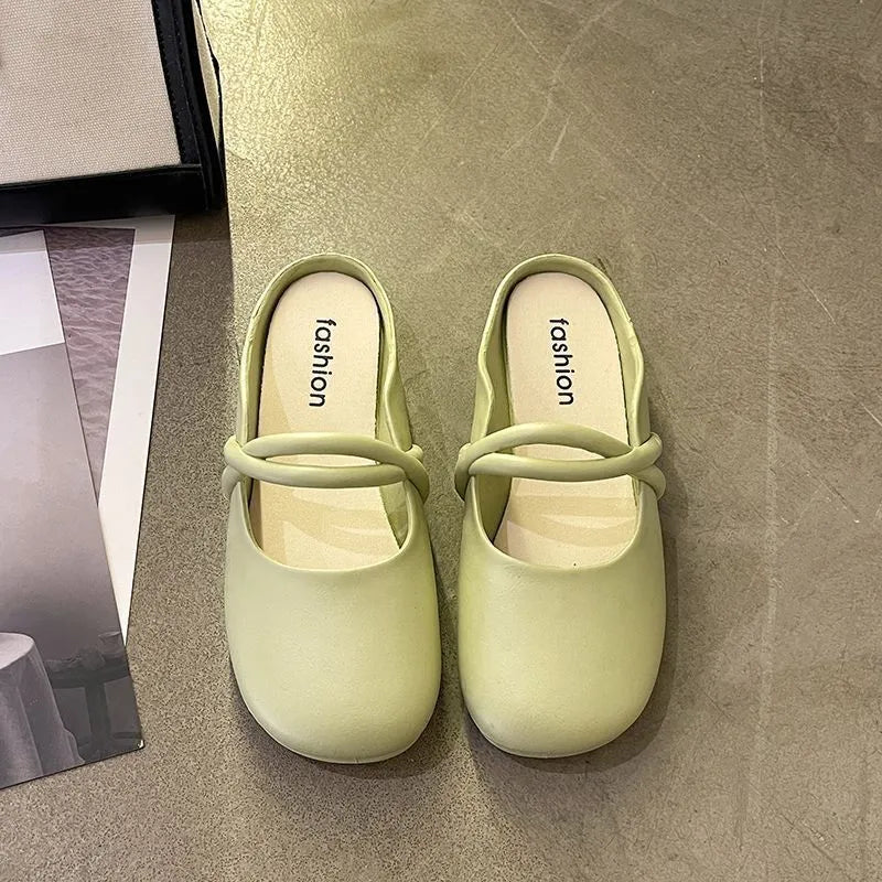 Women's plastic toe cap flip flop sandals in green, black, and beige colours on a summer background