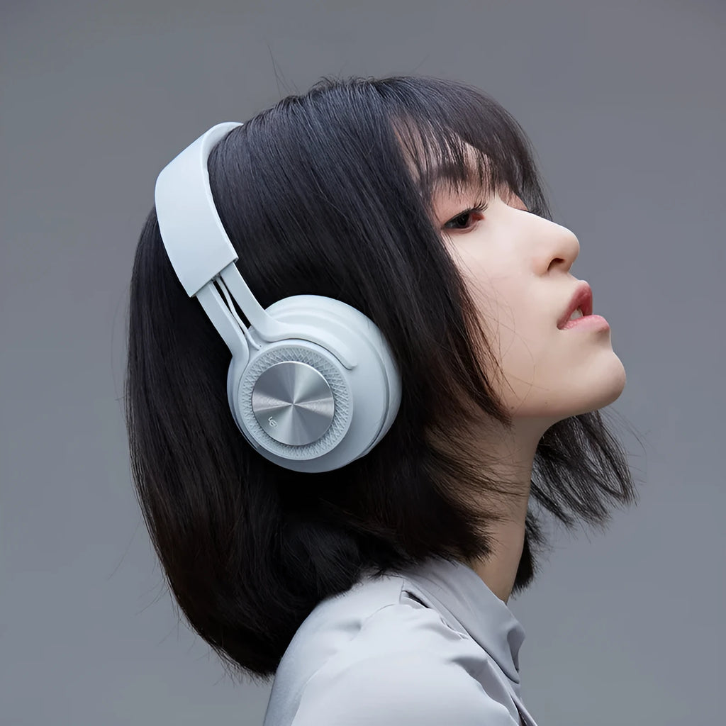 Red sports wireless Bluetooth headset showing earpiece and power display.