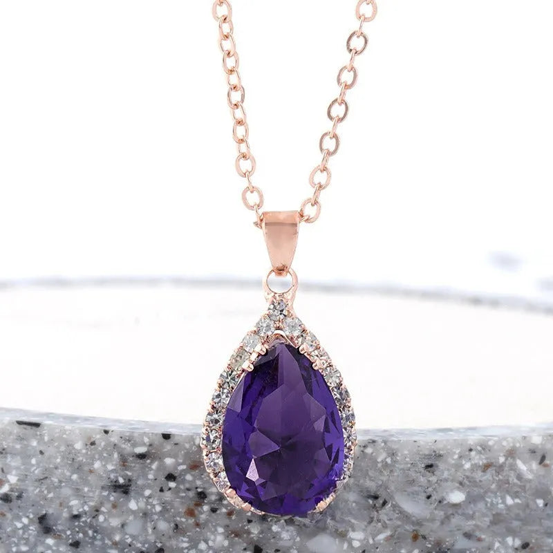 Women's alloy drop necklace with geometric rhinestone pattern in pink rose gold colour