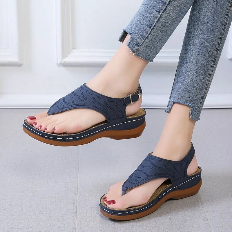 Women's casual wedge heel flip flop sandals with adjustable back strap in red, green, black, blue, and khaki