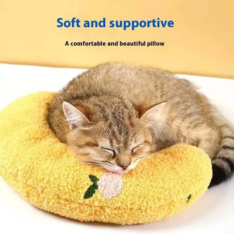 Blue U-shaped cat pillow bed in a Question Mark style on a white background