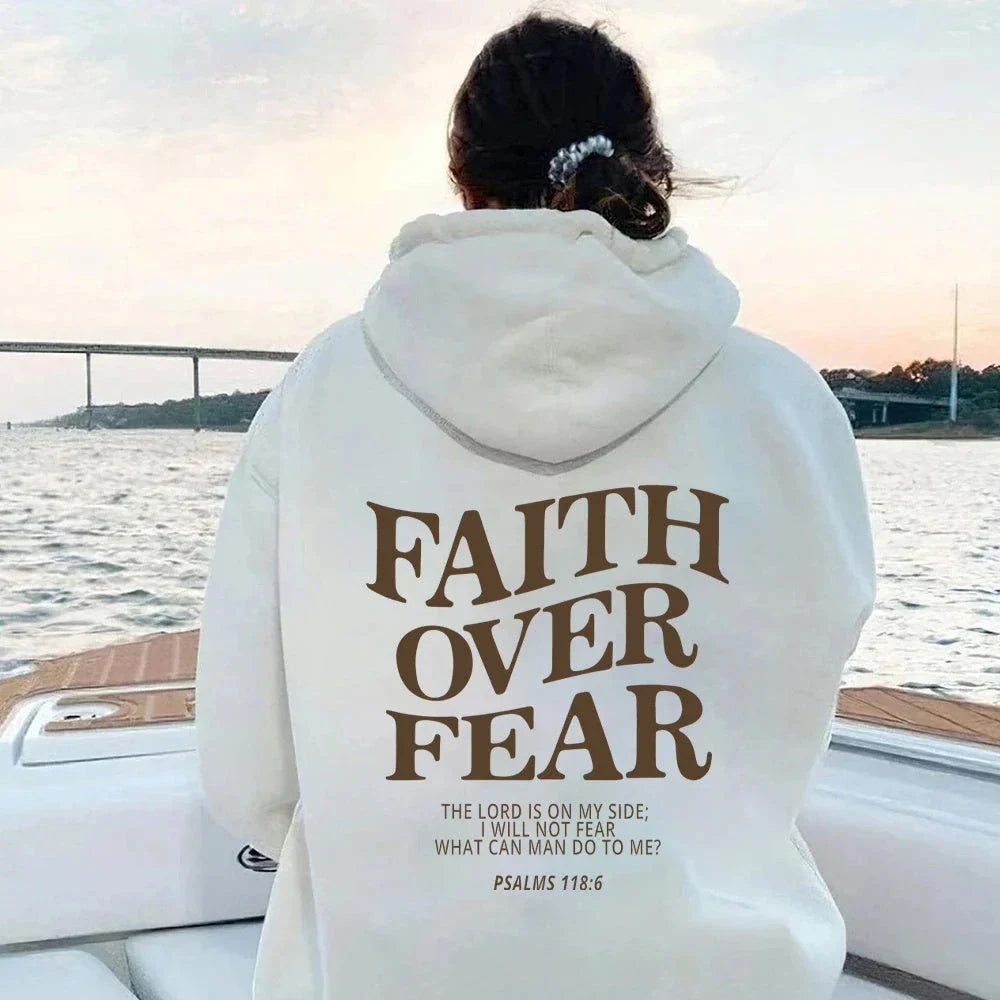 Inspirational Christian hoodie with 'Faith Over Fear' graphic in various colors