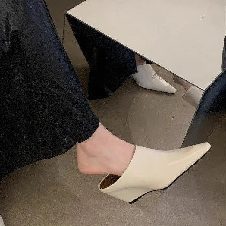 Women's black wind wedge closed toe half slipper made of PU material