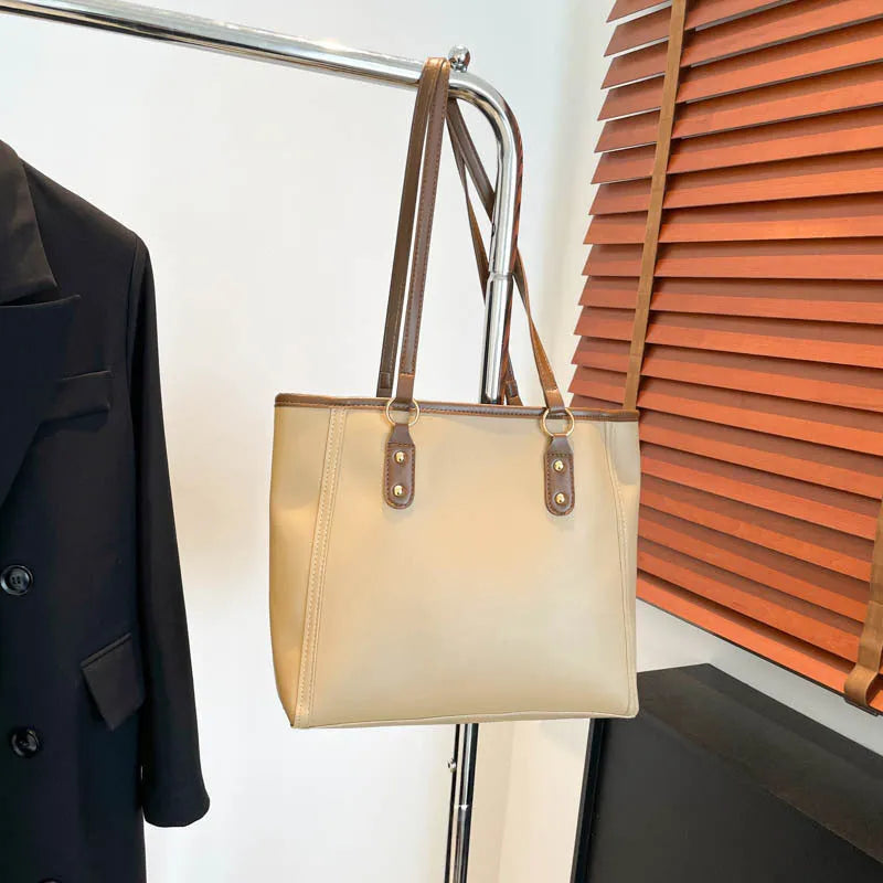Korean style square horizontal shoulder underarm bag in PU leather with a sandwich pocket.