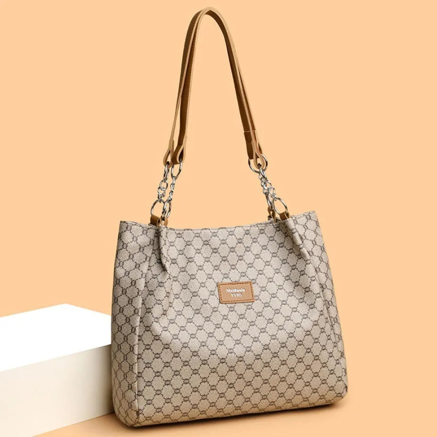 Brown retro fashion women's handbag made from soft PU leather with polyester lining