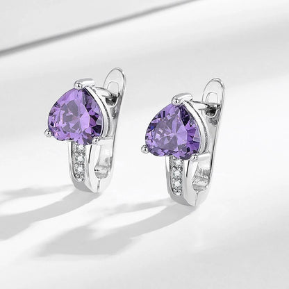 Loving Heart Zircon Ear Clips in white gold and yellow gold with diamond accents