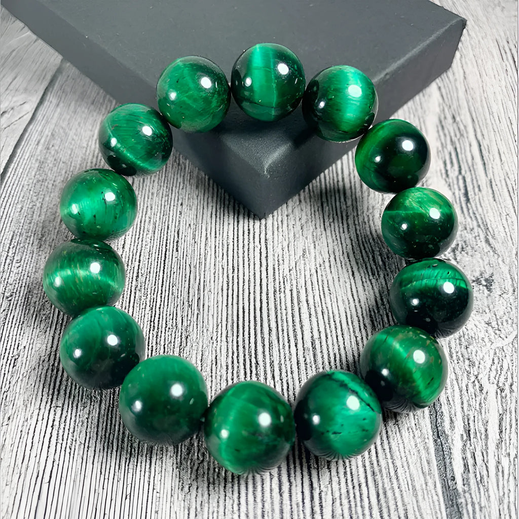 Green tiger eye stone geometric bead bracelet shown in different size options on a wrist.