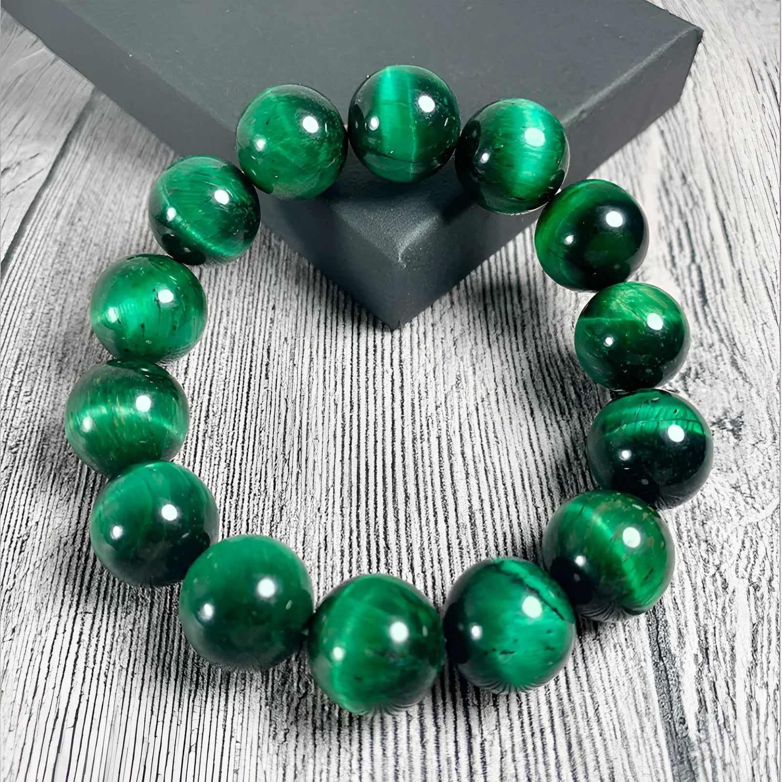 Green tiger eye stone geometric bead bracelet shown in different size options on a wrist.