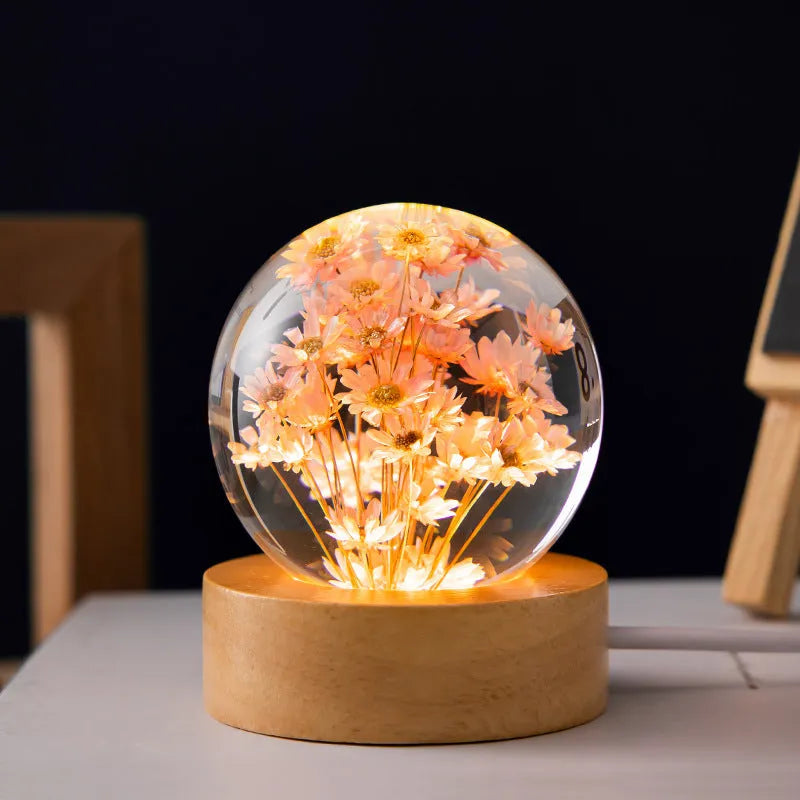 3D dandelion crystal ball desk lamp on beech wood stand, serving as a USB night light.