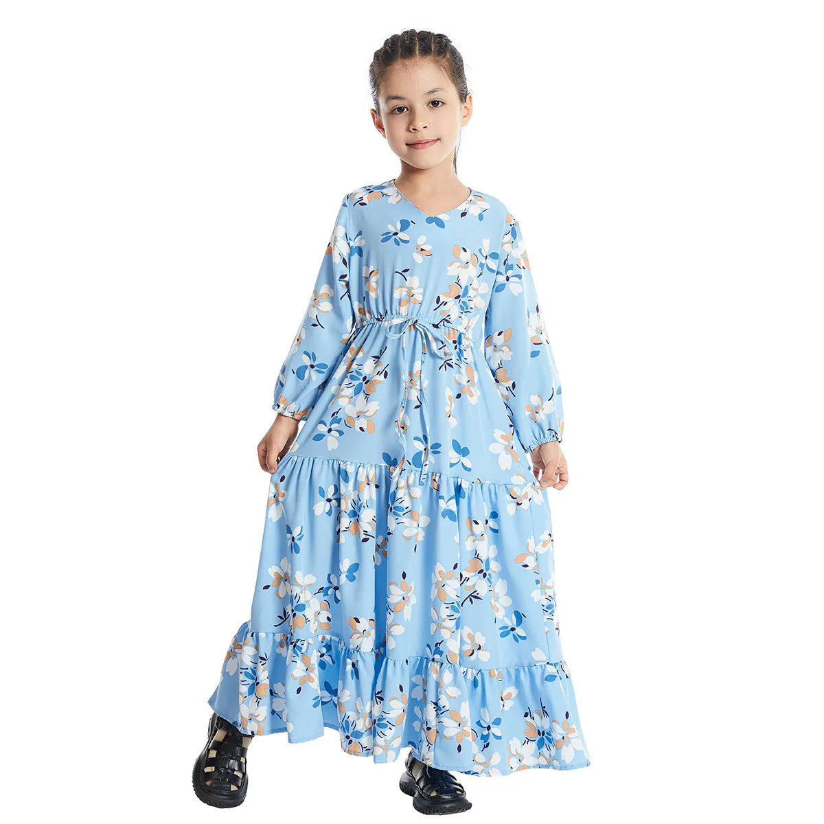Girl wearing a long sleeve floral polyester dress with a flounced skirt in beige, available in heights 100-160cm