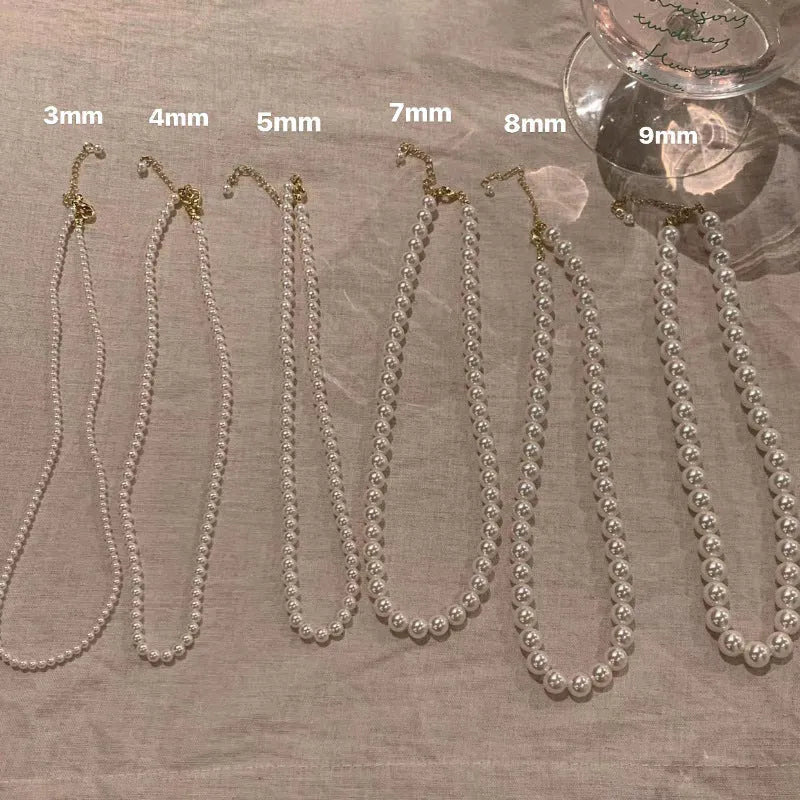 Australian white pearl mother pearl shellfish necklace with organic glass pendant on a regular chain, unisex design