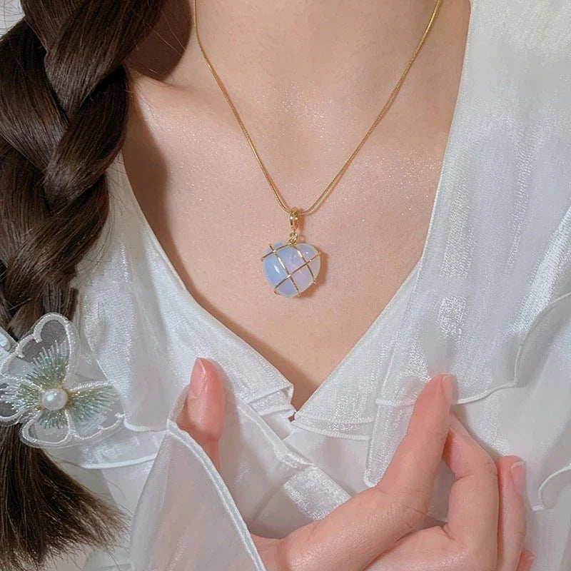 Heart-shaped moonstone pendant necklace with gold plating and adjustable chain
