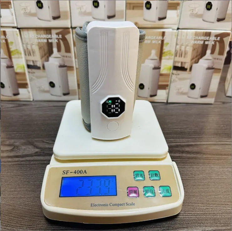 Grey and white car charger electric milk warmer for baby bottles