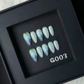Blue plastic shell-shaped artificial nail stickers in four sizes XS S M L