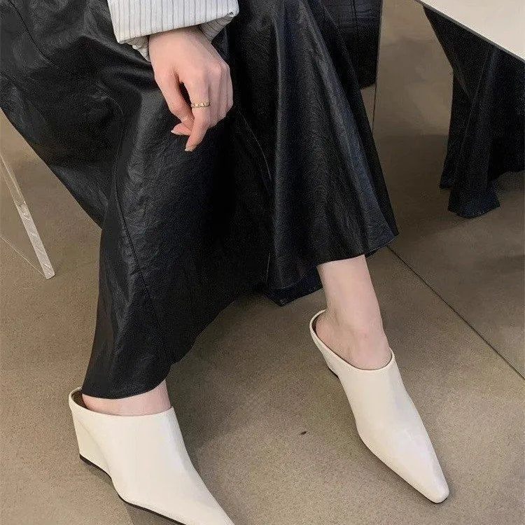 Women's black wind wedge closed toe half slipper made of PU material