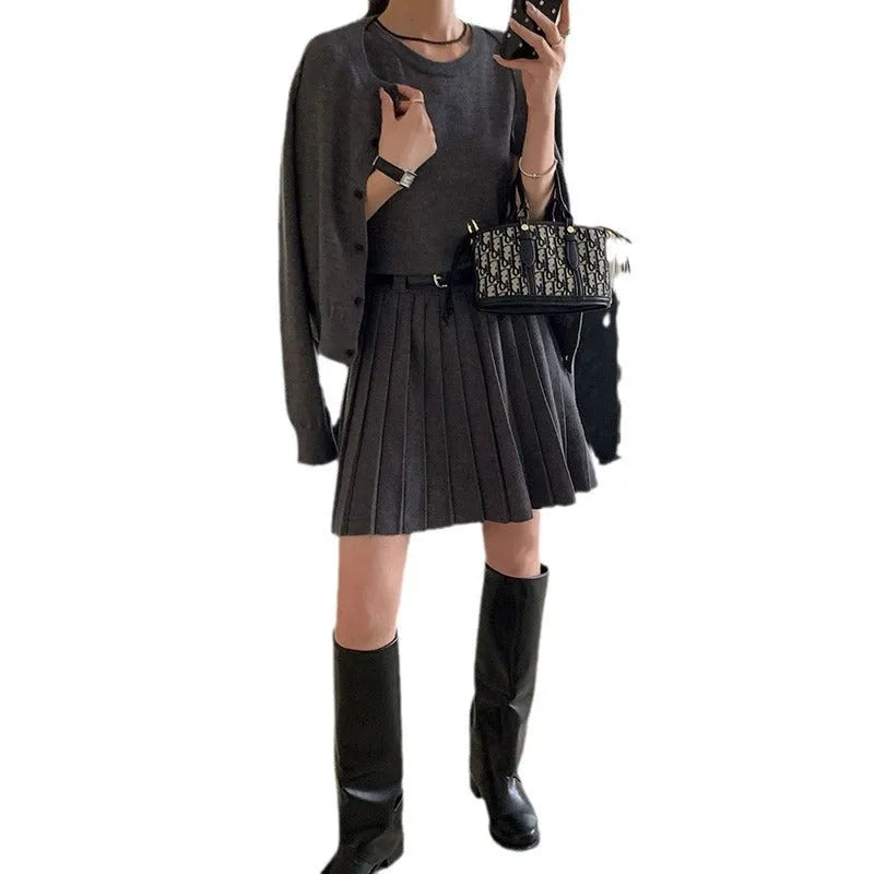 Women's grey art retro knitted vest skirt and long-sleeved cardigan two-piece set with belt.