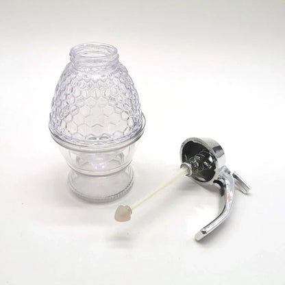 Transparent acrylic honey dispenser with squeeze bottle design for drip-free pouring control