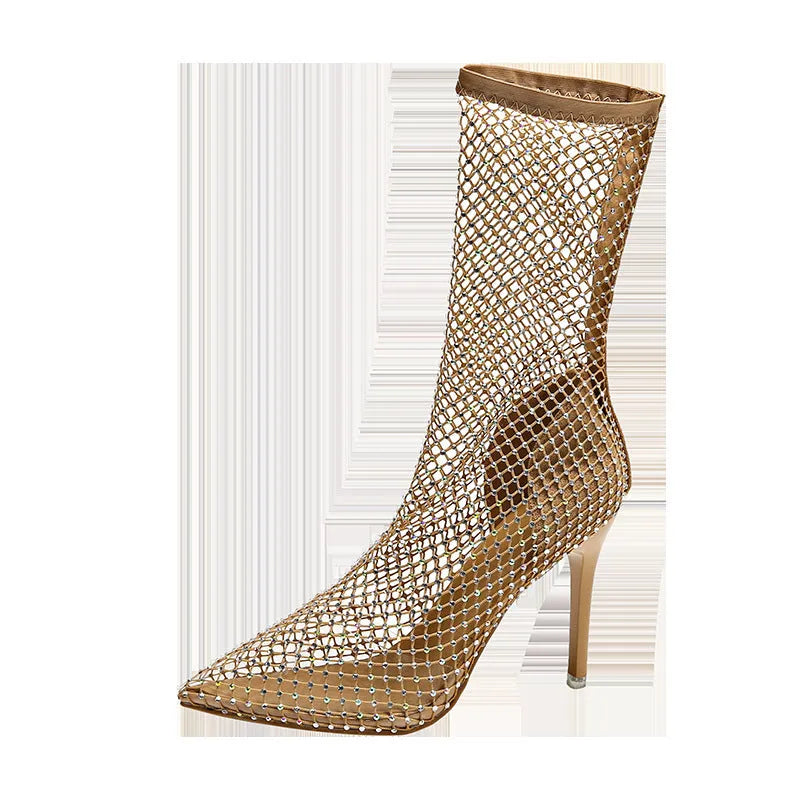 Gold high heel sandals with pointed stiletto design and mesh upper material