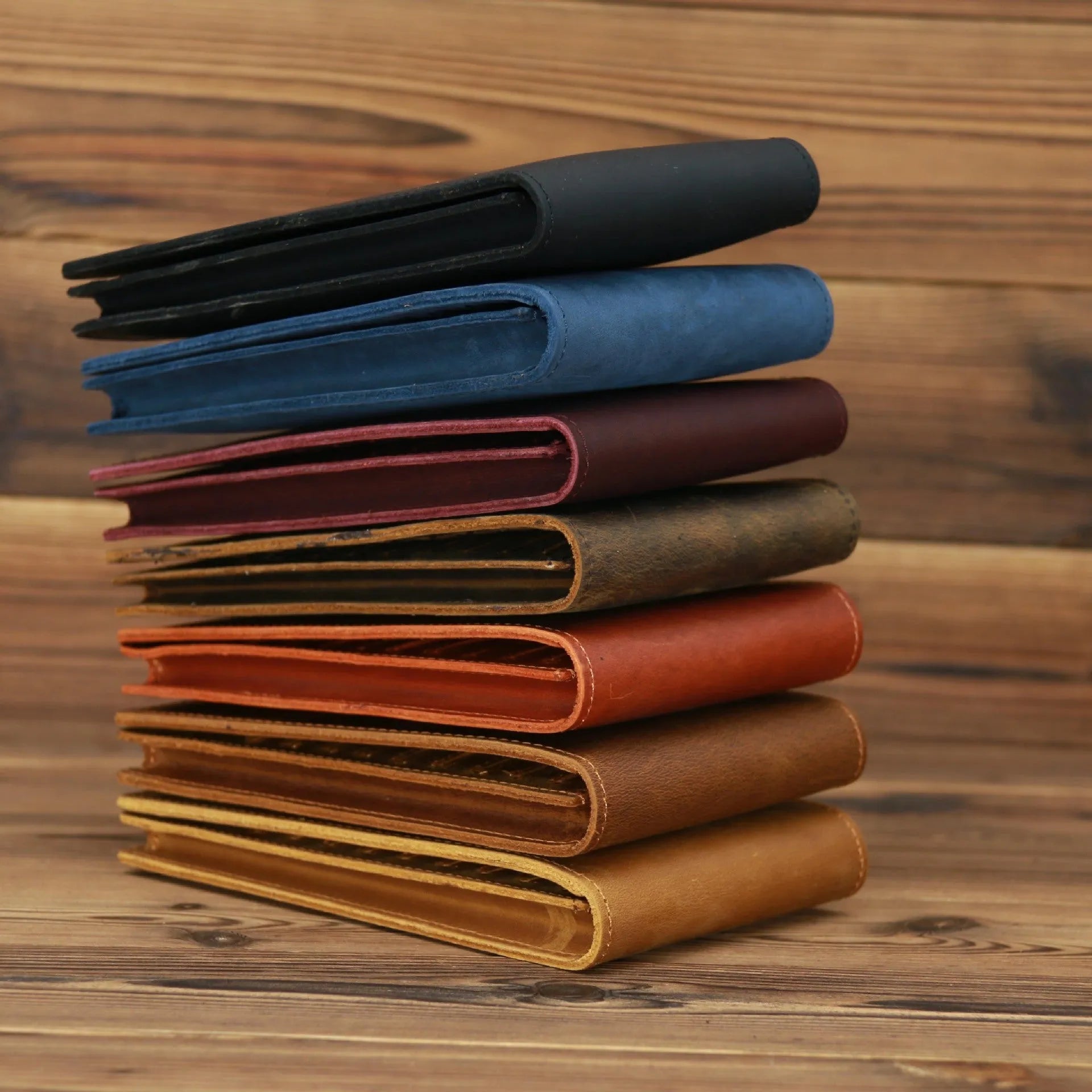 Men's cowhide card wallet with multiple slots shown open, displaying card and phone compartments.