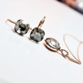 Austrian crystal geometric copper ear studs for women in champagne gold colour