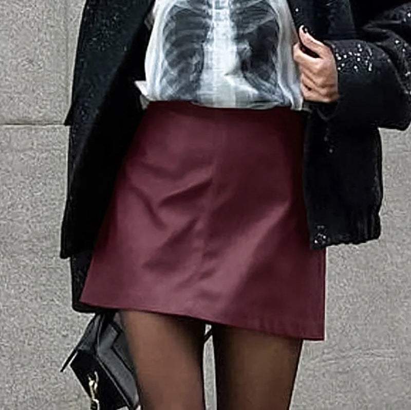 Women's wine red matte leather A-line skirt with 50% PU construction, 3% spandex for micro elasticity, and concealed zipper closure - available in S/M/L sizes with 2-3cm measurement tolerance
