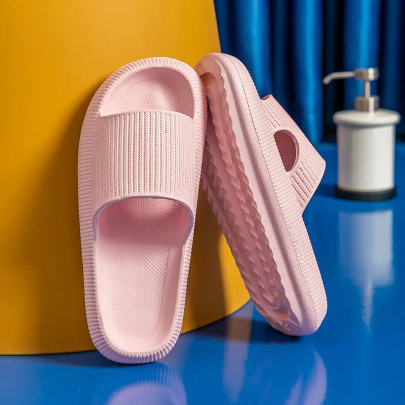 Stylish and comfortable EVA bathroom slippers with soft cushioned soles and anti-slip design, available in a variety of vibrant colors.