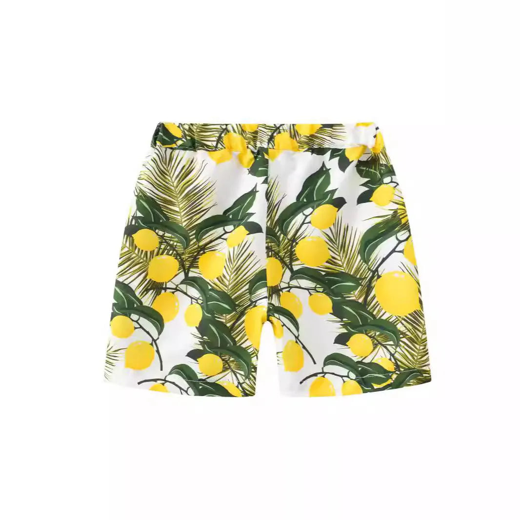 Children's colourful printed beach shorts with hairband belt waistband in coconut tree design