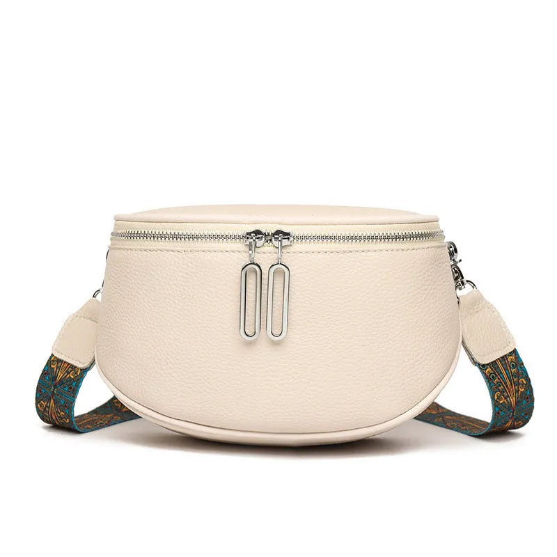 Women's saddle-shaped PU leather messenger bag with single shoulder strap in black, white, or green colour options