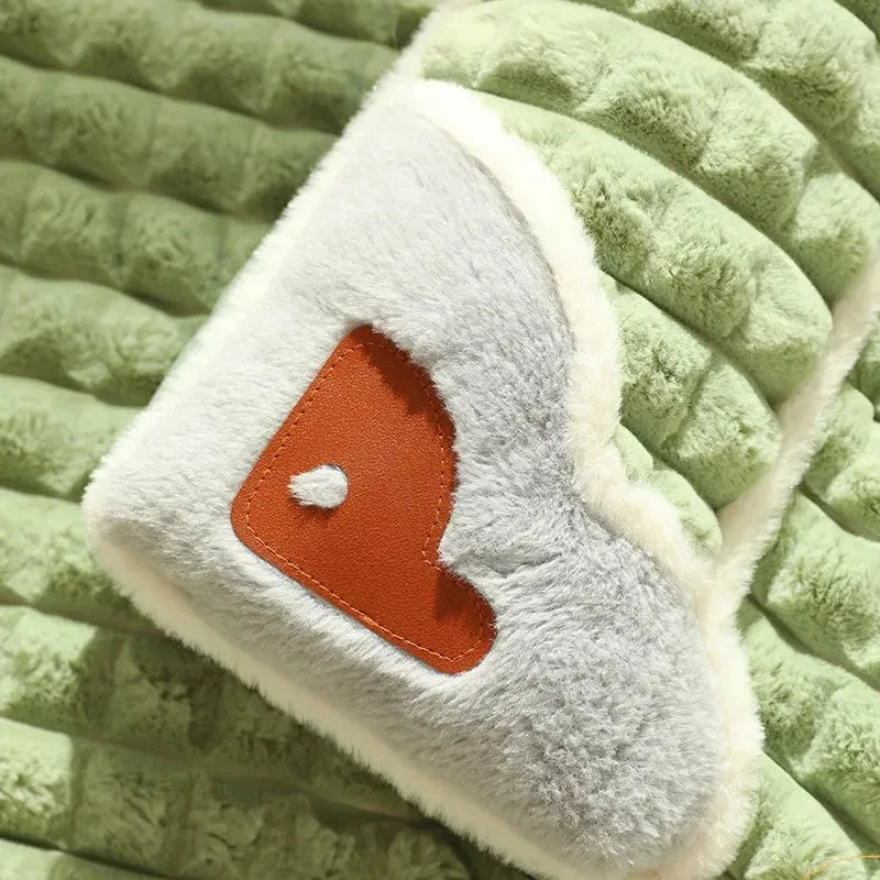 A large grey washable dog mat with a detachable cover, shown with a dog lying on it.