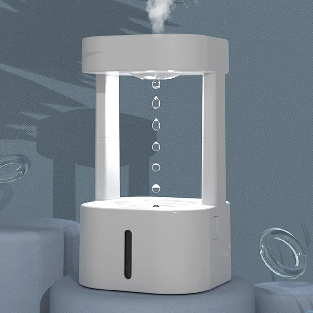 White anti-gravity water drop humidifier with coloured lights and USB cable