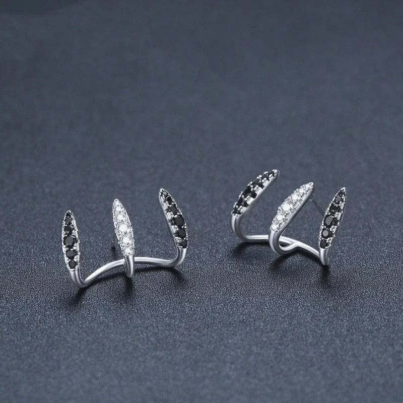 Black three-claw ear clip copper simple zircon earrings with geometric design