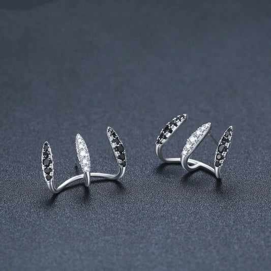 Black three-claw ear clip copper simple zircon earrings with geometric design