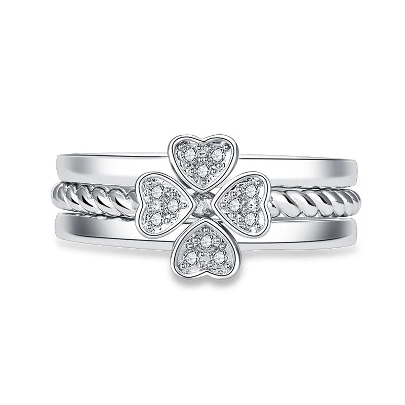 Adjustable four-leaf clover ring with spinning top design and zircon accents