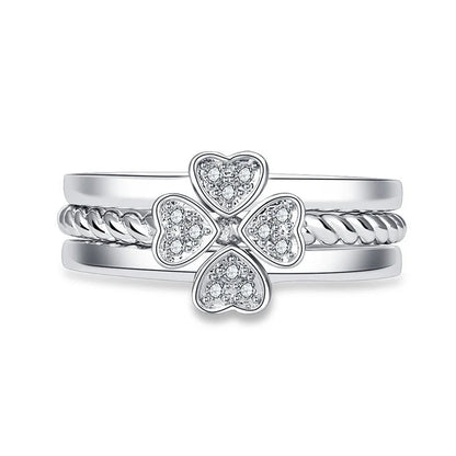 Adjustable four-leaf clover ring with spinning top design and zircon accents