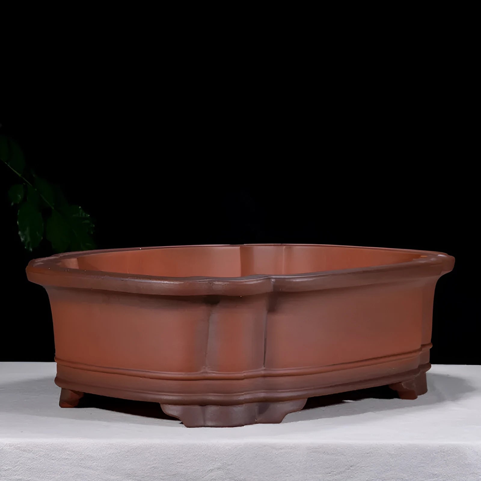 Large antique finish purple clay flowerpot with carved tree stump design featuring pine, cypress, pomegranate, golden marble and crabapple motifs