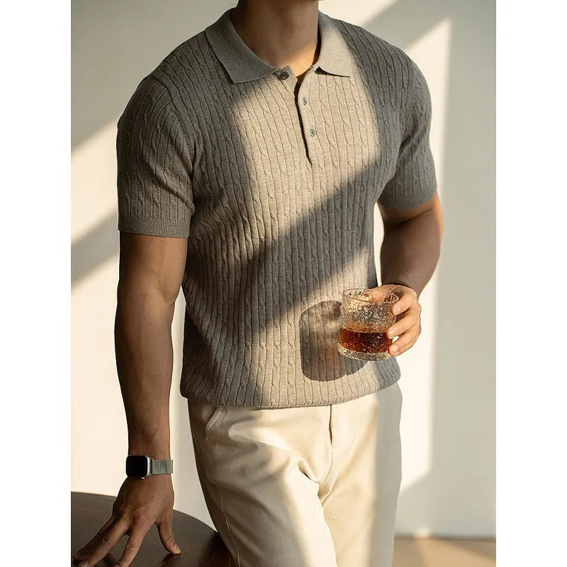 Men's khaki short sleeve business top laid flat, showing collar and sleeve detail.