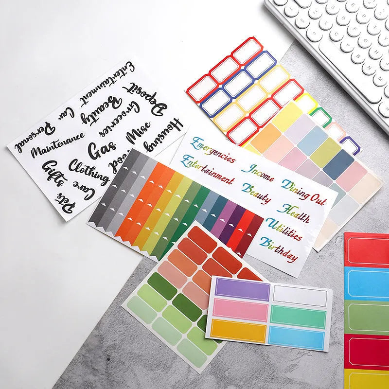 Handwritten label stickers showing 16-grid blue, 21-grid, and 24-grid adhesive designs for organisation