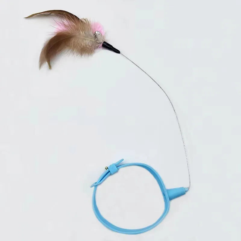 Blue adjustable cat collar with feathers and bell, plus a teasing wand with a soft silicone tip.