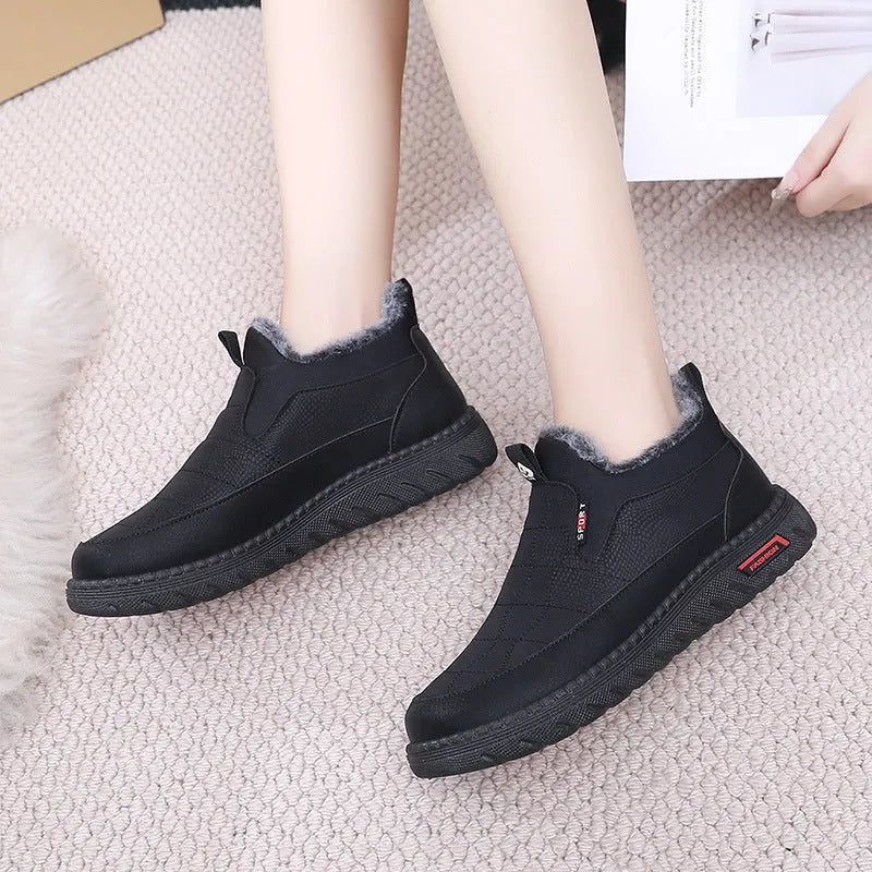 Women's black casual flat boots with round toe and rubber sole