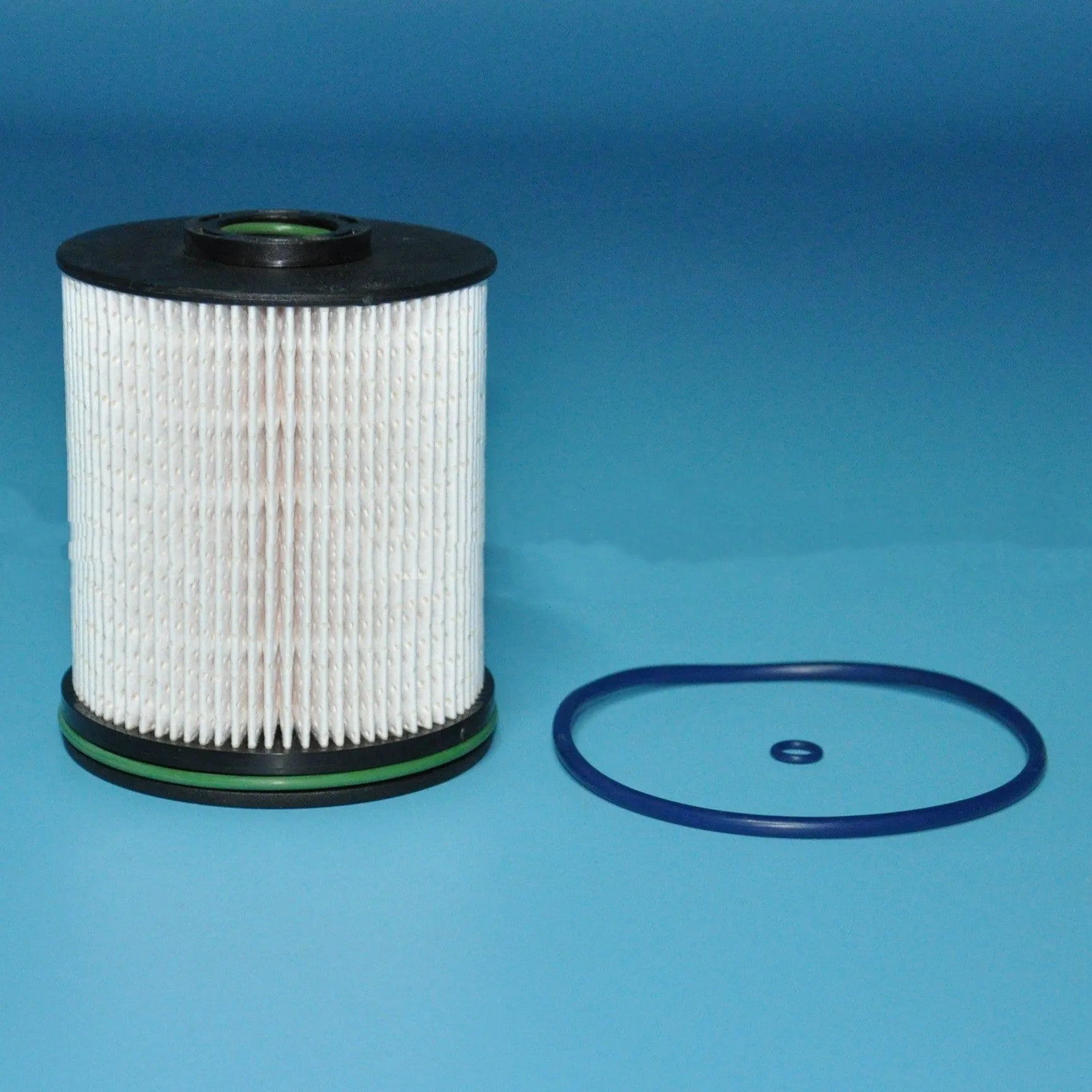 Diesel fuel filter element with gasket for Vauxhall and Opel Astra models, 106mm tall.