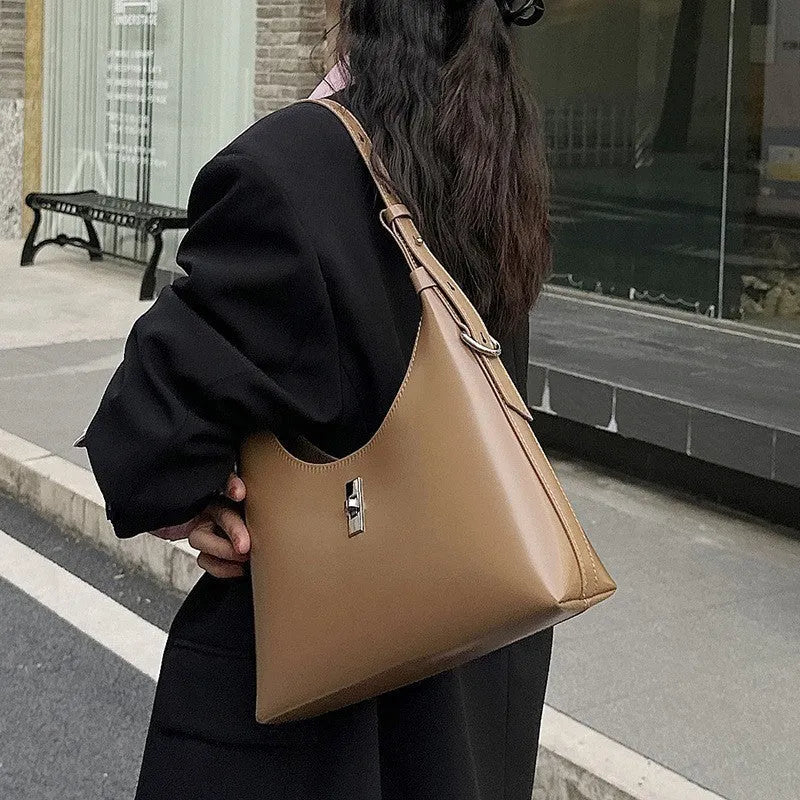 Genuine leather dumpling-shaped crossbody bag with mobile phone compartment in apricot colour