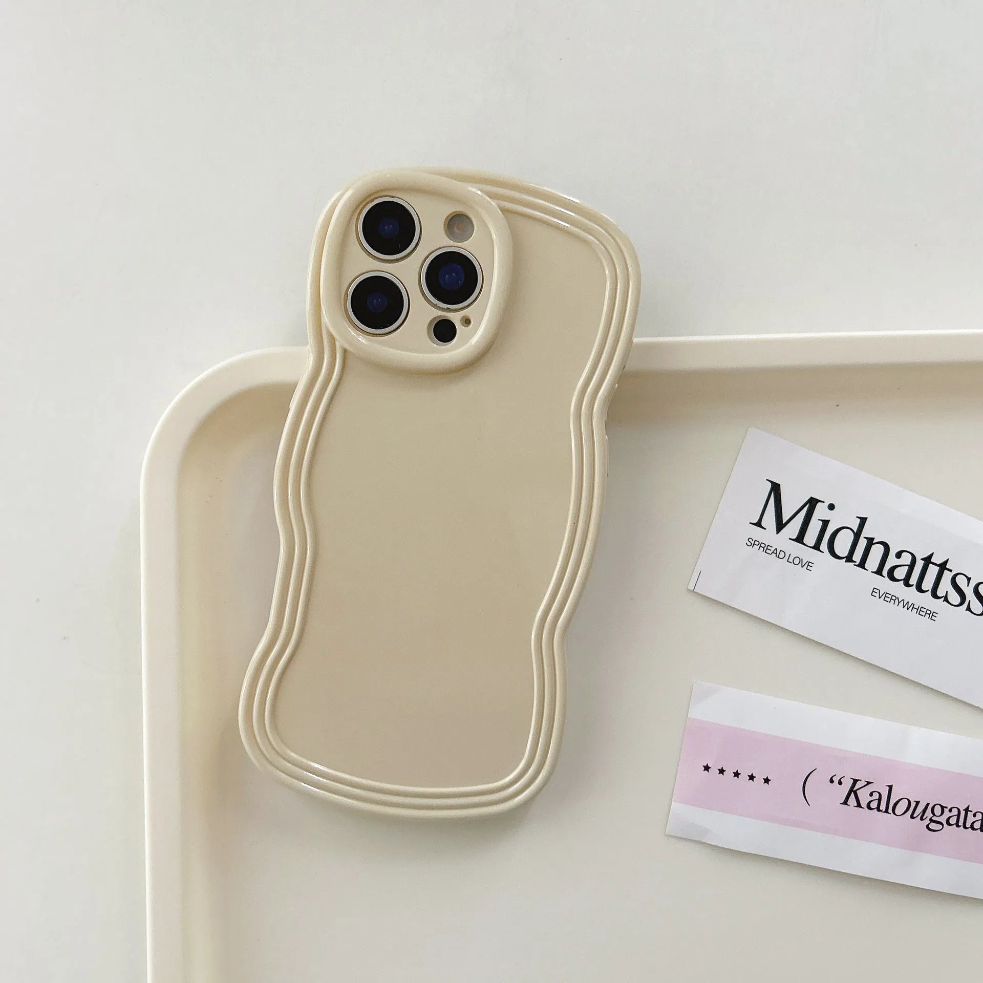 Cream candy colour wave pattern TPU phone case for iPhone, showing anti-fingerprint surface.