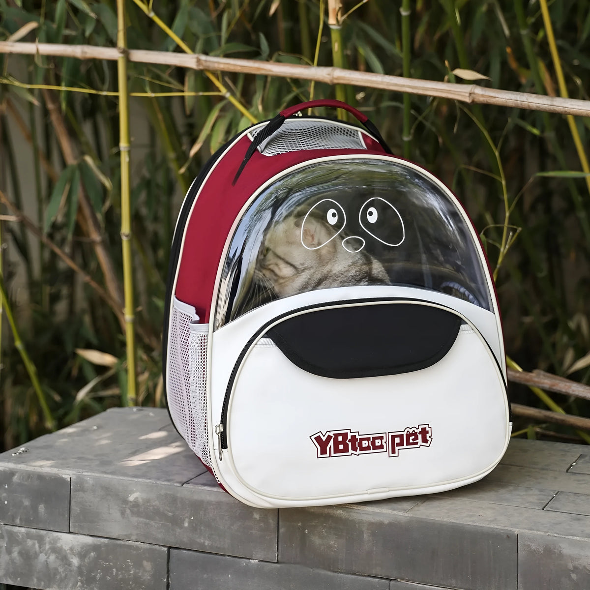 Portable pet backpack carrier in black Oxford cloth with large capacity for cats and dogs