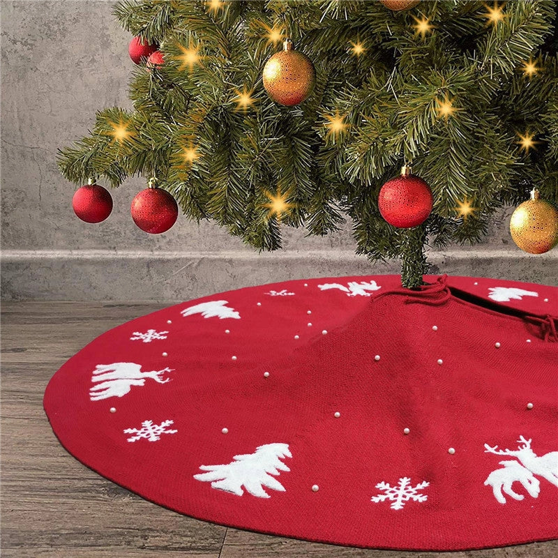 Handmade knitted Christmas tree skirt with pearl embellishment and 3D patterns