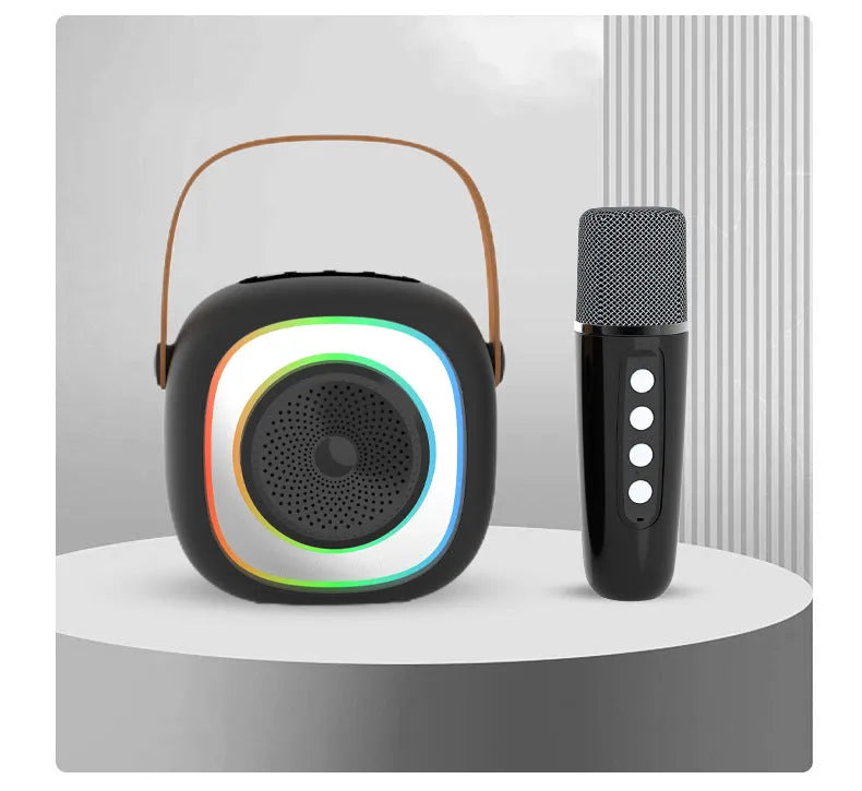 Wireless black and wheat coloured Bluetooth karaoke microphone with card slot and USB port.