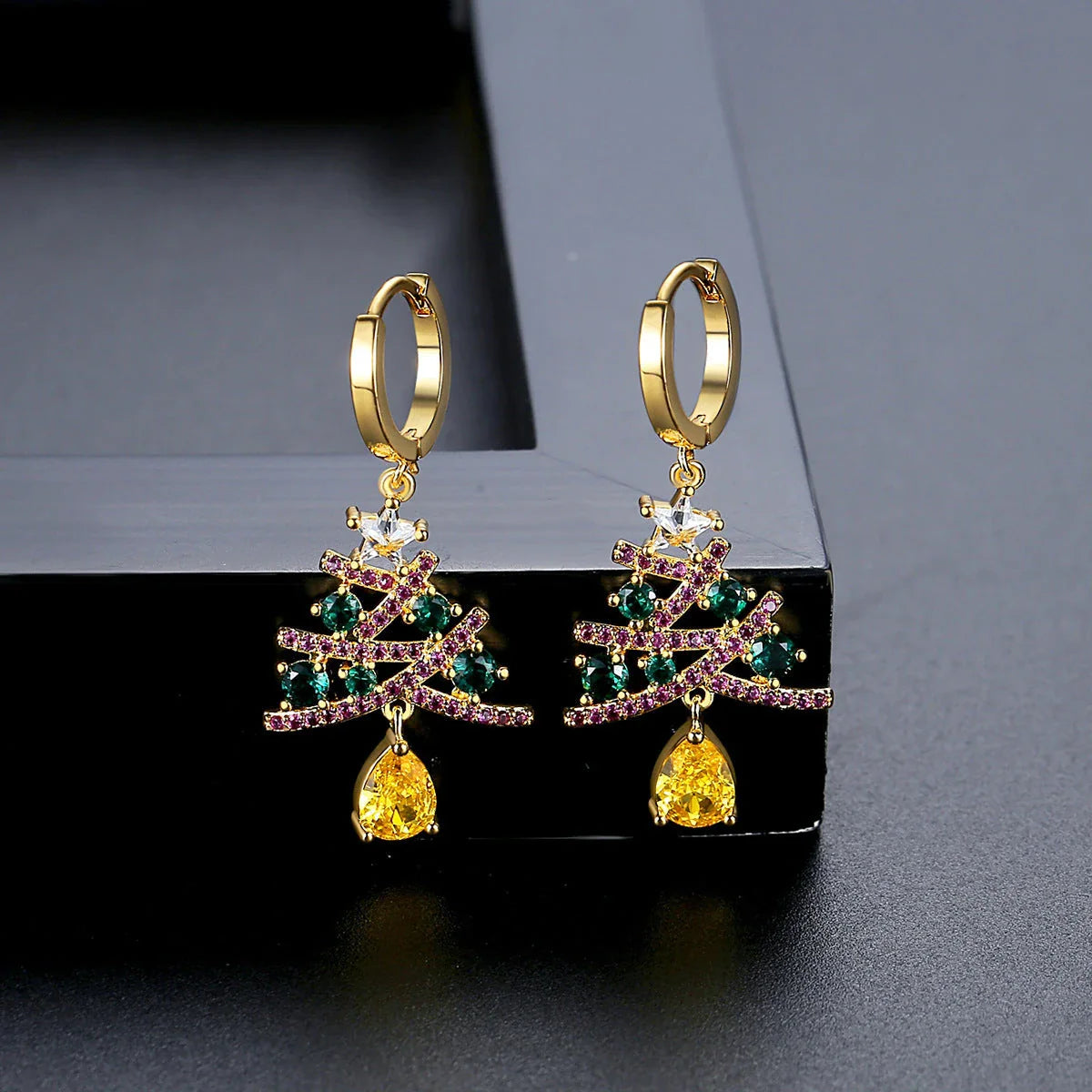 Elegant Christmas tree earrings with colorful rhinestones, a festive fashion accessory for women