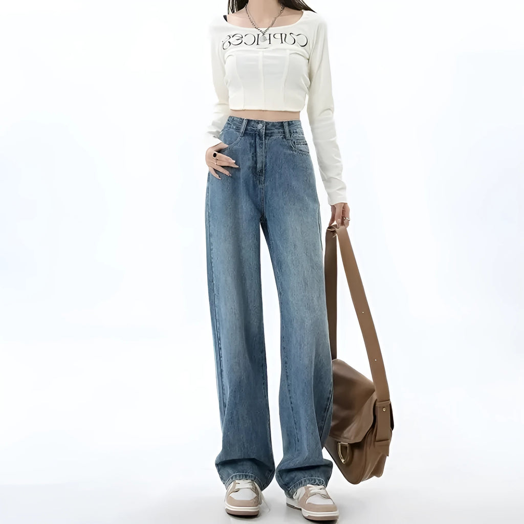 Woman wearing retro blue high waist wide leg jeans with a straight cut
