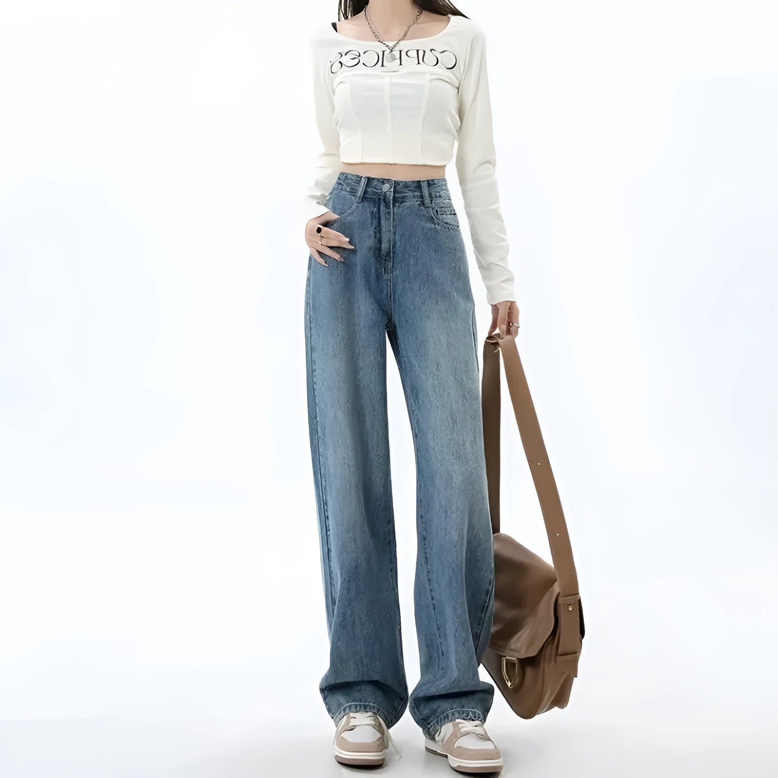Woman wearing retro blue high waist wide leg jeans with a straight cut